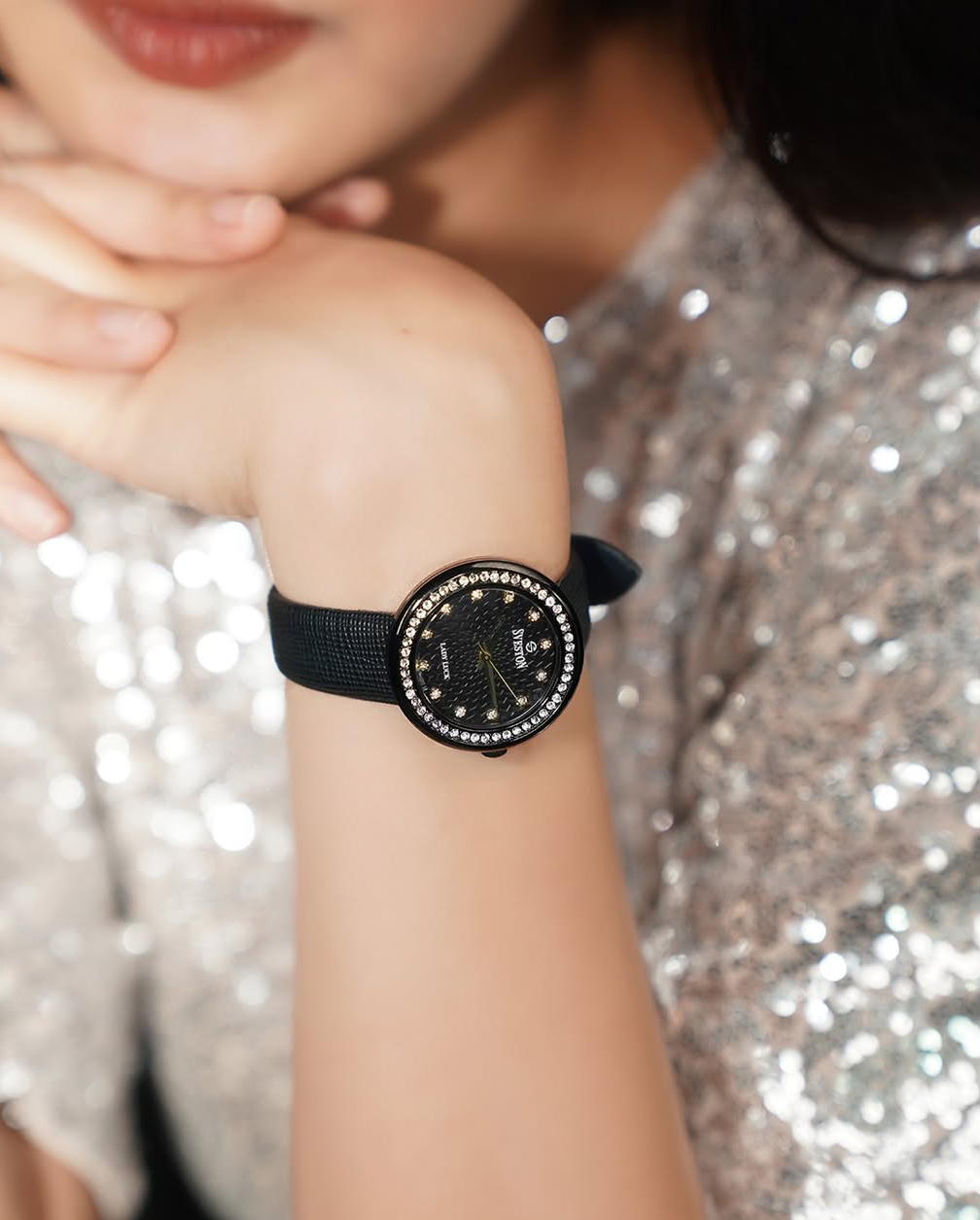 Clean wristwatch being cared for with a soft cloth